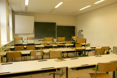 An empty classroom in a school building during school vacation