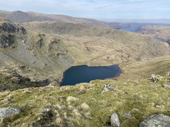 Scenic view of landscape and mountains against sky
