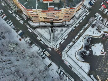 Aerial view of snowy road in city