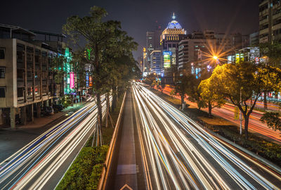 Light trails on city street at night