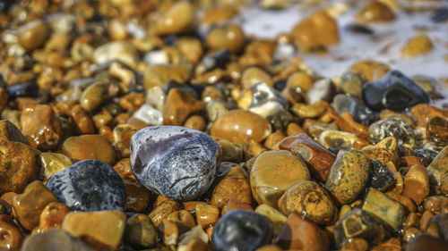 Full frame shot of pebbles on beach