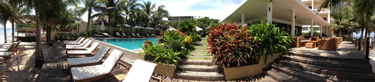 Panoramic view of swimming pool against sky