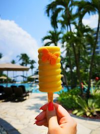 Hand holding ice cream cone