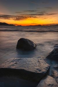 Scenic view of sea against sky during sunset