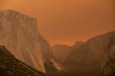 Scenic view of mountains against sky during sunset