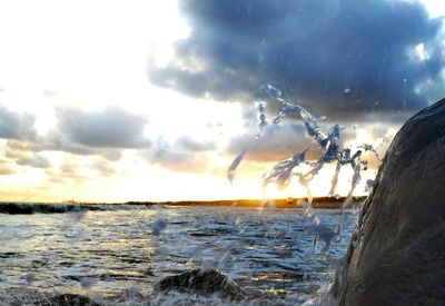 Panoramic view of sea against sky during sunset