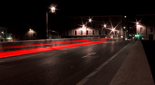 Light trails on city street at night