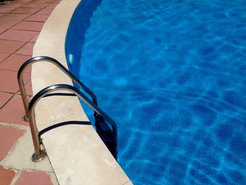 View of ladder in swimming pool