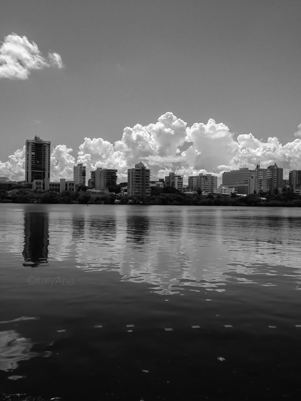 building exterior, architecture, built structure, water, city, sky, waterfront, cityscape, reflection, river, residential building, residential structure, skyscraper, residential district, lake, building, cloud, rippled, cloud - sky, outdoors