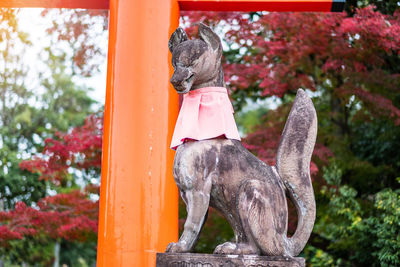 Rear view of dog statue