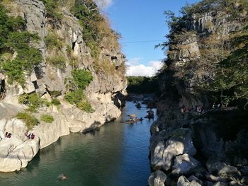 High angle view of lake amidst mountains