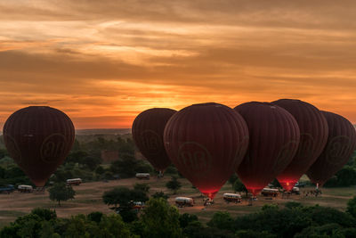 Hot air balloon against sky at sunset