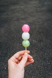 Person holding ice cream cone