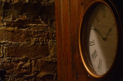 Close-up of clock on wall