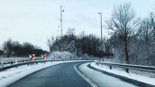 Empty road against clear sky