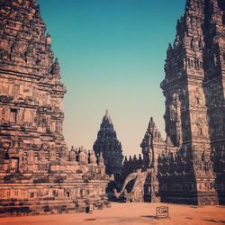 Ruins of temple against clear sky