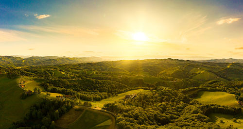 Gorgeous sunset over beautiful green vineyards. aerial panorama sunset 