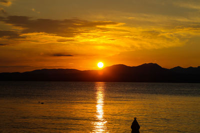 Scenic view of sea against sky during sunset