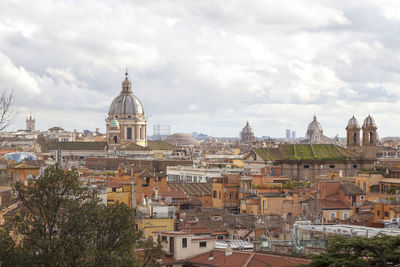 Cityscape of rome in italy with many of its churches.