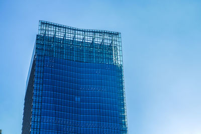 Low angle view of modern building against clear sky