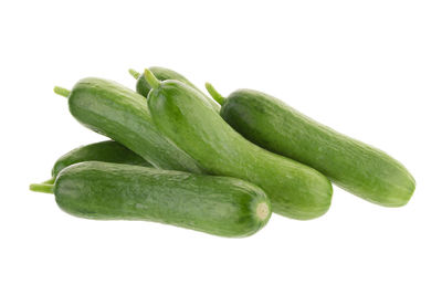 Close-up of green pepper against white background