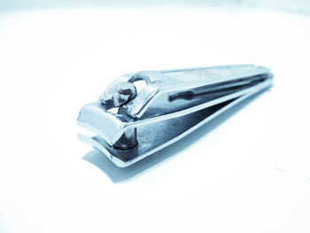 Close-up of toy car on table against white background