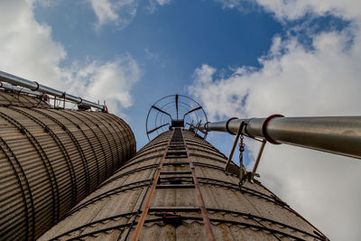 Low angle view of metal structure against sky