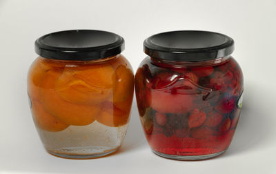 Close-up of drink in glass jar on table