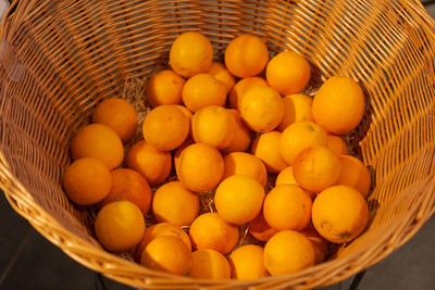 High angle view of oranges in basket