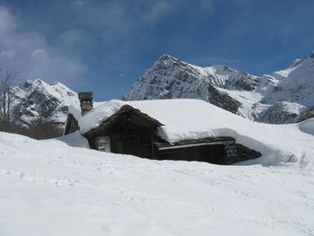 Snow covered mountain against sky