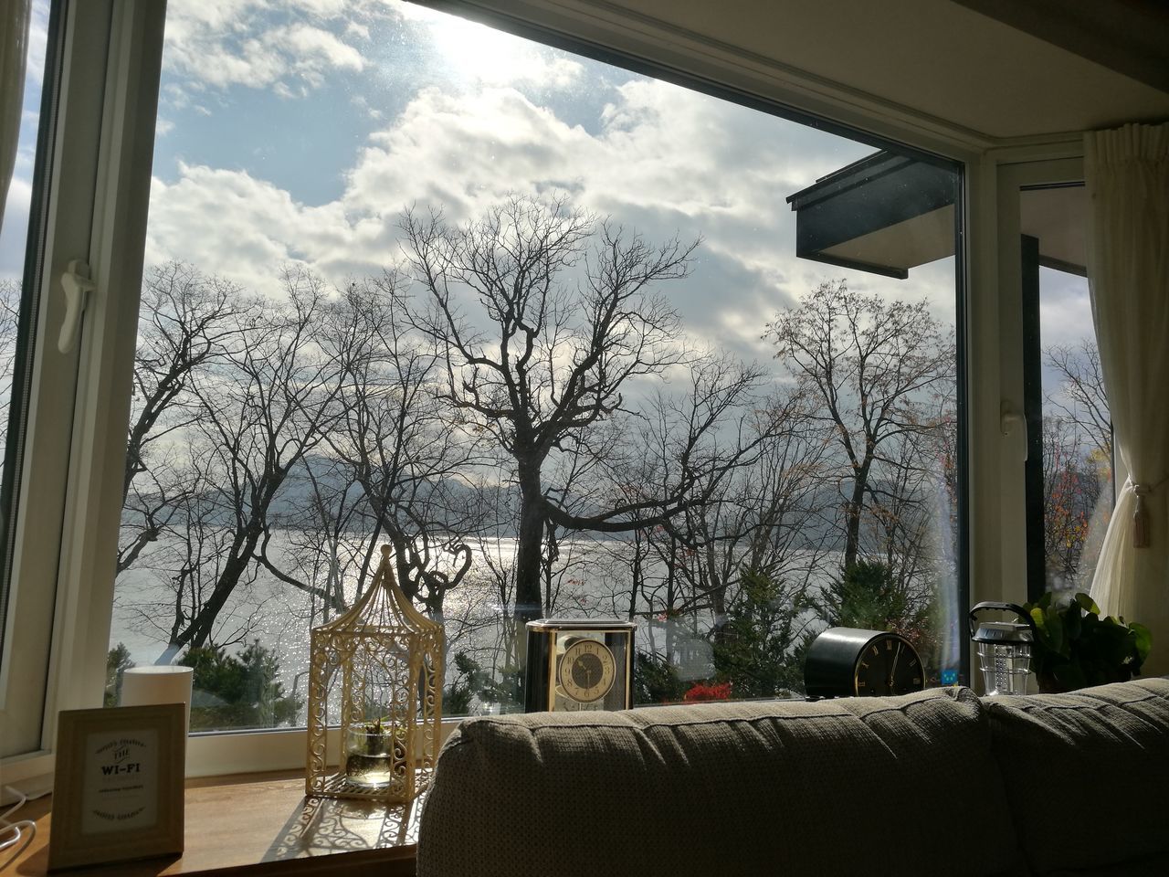 bare tree, tree, sky, window, day, cloud - sky, no people, communication, architecture, built structure, indoors, nature