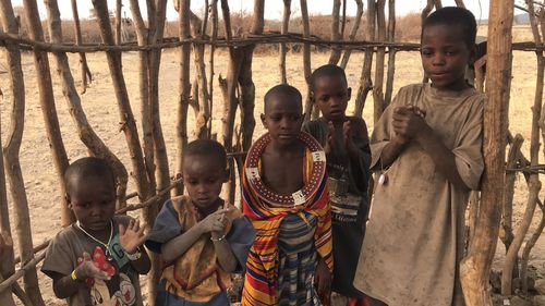 People standing in traditional clothing