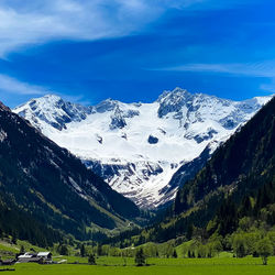 Scenic view of snowcapped mountains against sky