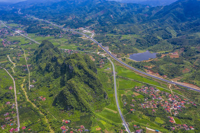 High angle view of road amidst trees