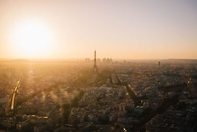 High angle view of city against sky during sunset