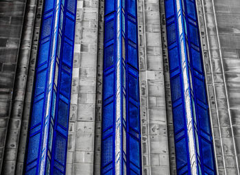 Low angle view of blue tied on rope