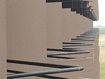 Shadow of railing on wall