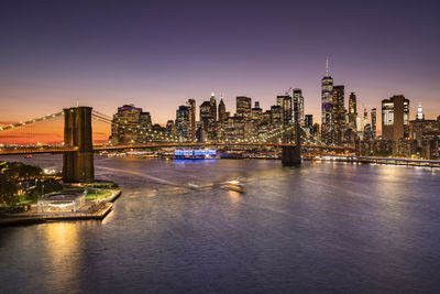 Illuminated buildings in city at night