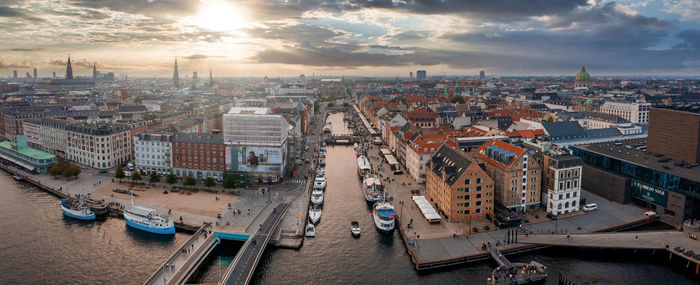 Famous nyhavn pier with colorful buildings and boats in copenhagen, denmark.