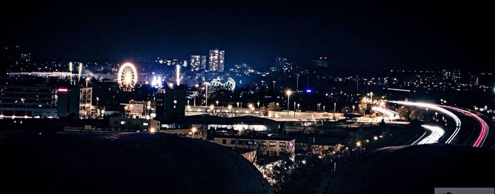 Illuminated cityscape at night