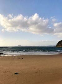 Scenic view of beach against sky