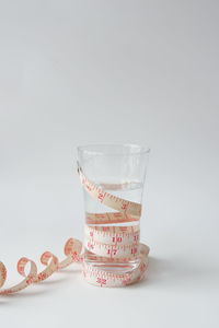 Close-up of glass against white background