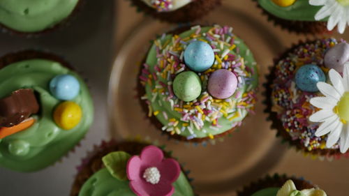 High angle view of easter cupcakes on table