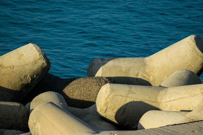 Close-up of rocks by sea
