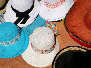 High angle view of sunhats on floor