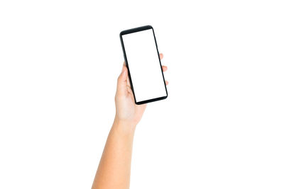 Midsection of person using smart phone against white background