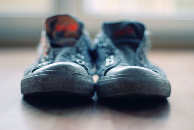 Close-up of canvas shoes on floor