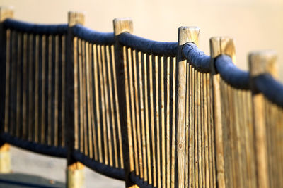 Close-up of human hand on metal railing