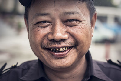 Close-up portrait of smiling man