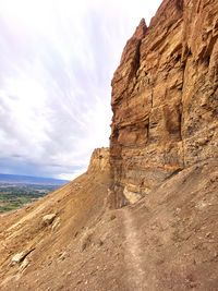 Scenic view of rocky mountains against sky